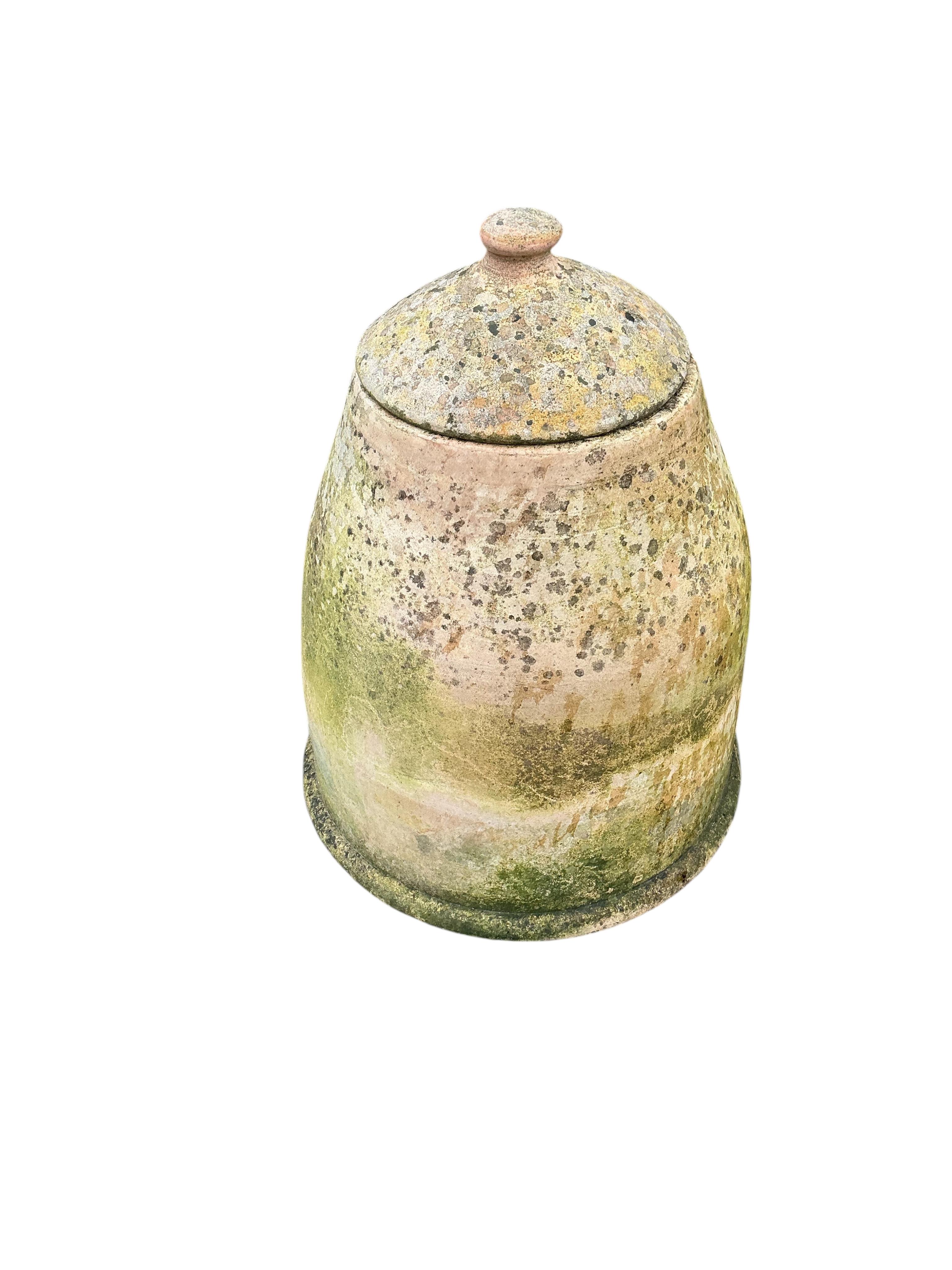 Two circular earthenware rhubarb forcers and covers, height 46cm